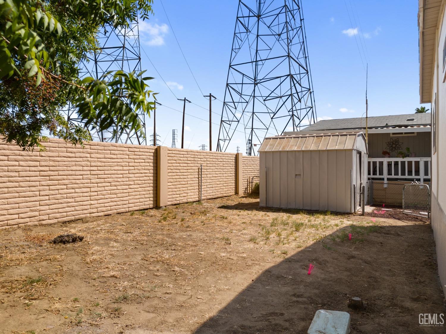 Undisclosed Address Bakersfield, CA 93306 - Photo 25 of 25 a view of a house with a tree