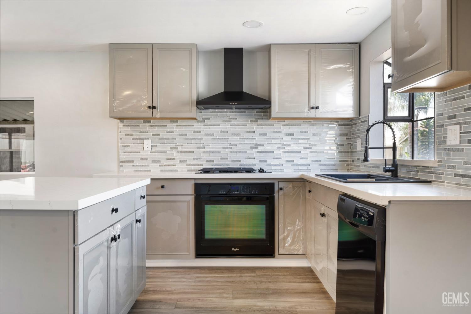Undisclosed Address Bakersfield, CA 93306 - Photo 4 of 25 a kitchen with stainless steel appliances granite countertop a stove and a sink