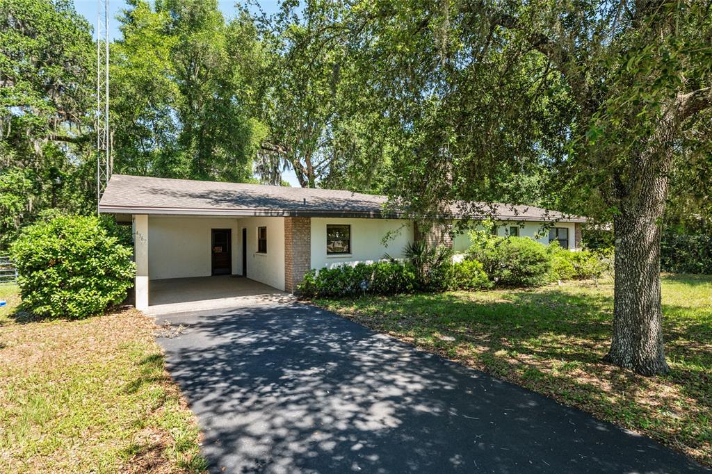4367 Highway 301 Bushnell, FL 33513 - Photo 1 of 44 a view of a house with a yard