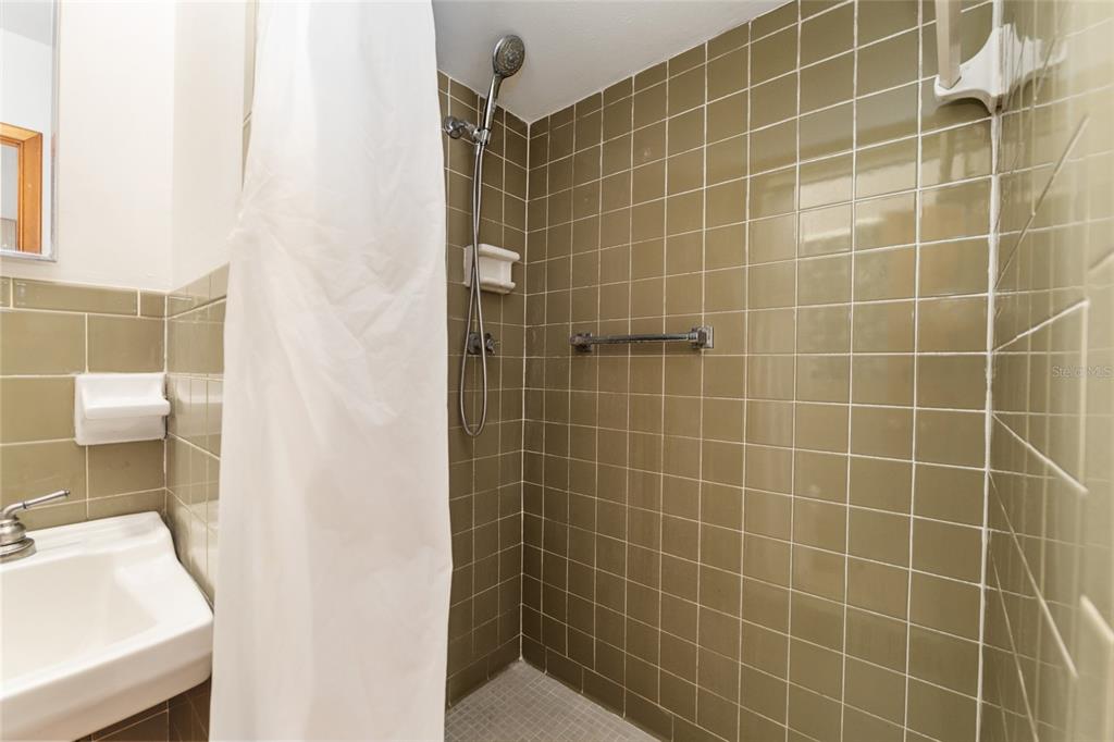 4367 Highway 301 Bushnell, FL 33513 - Photo 23 of 44 a bathroom with a sink toilet and shower
