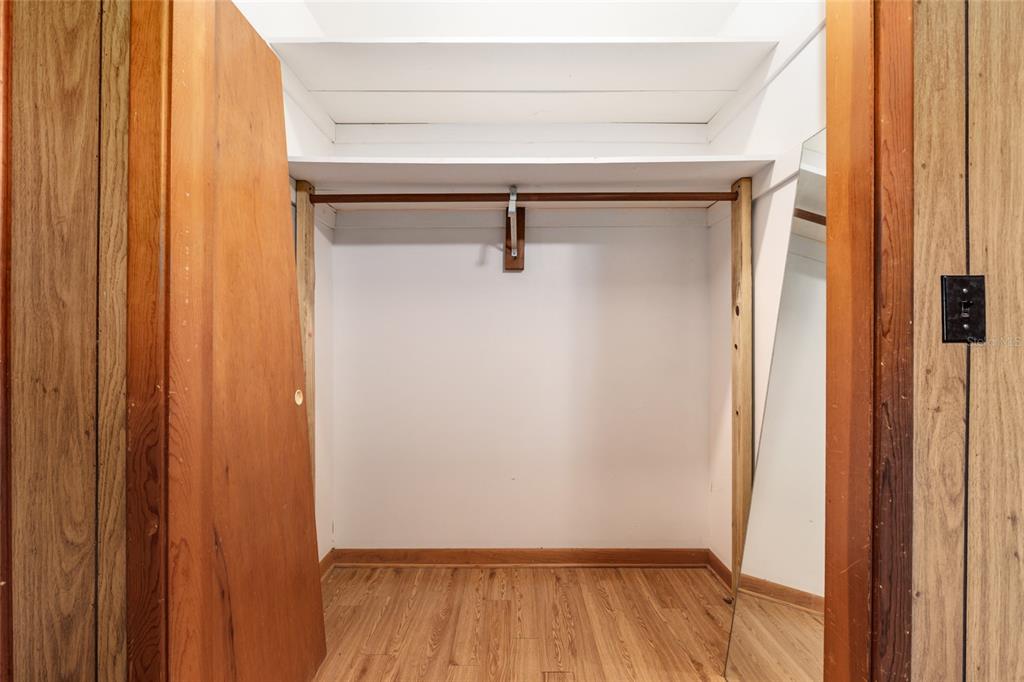 4367 Highway 301 Bushnell, FL 33513 - Photo 25 of 44 a view of a room with wooden floor