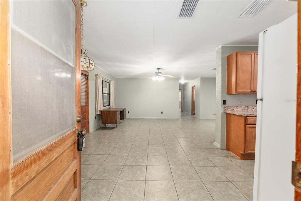 4367 Highway 301 Bushnell, FL 33513 - Photo 6 of 44 a view of a kitchen with a sink and a stove top oven
