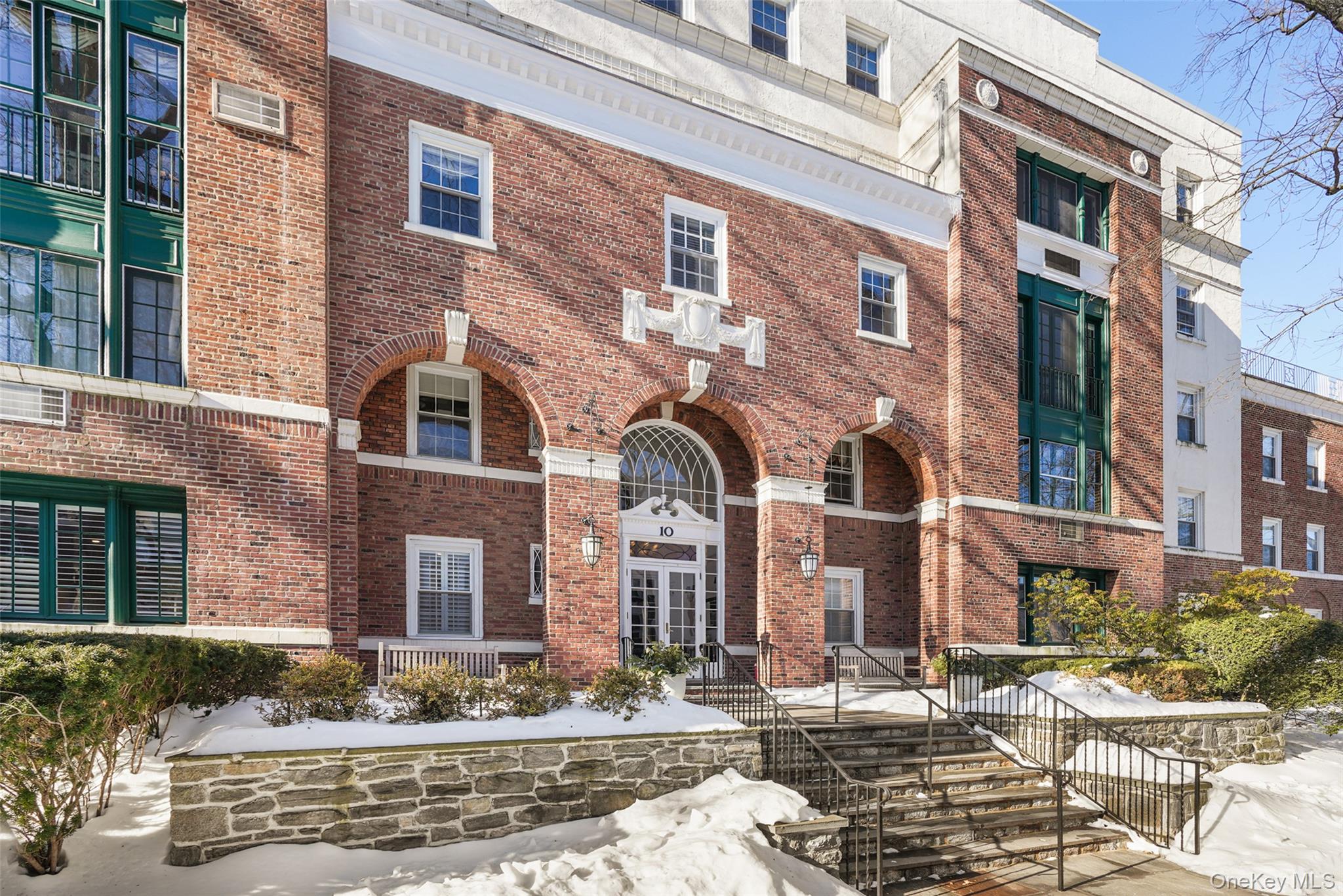 10 Brooklands, Unit 5G Bronxville, NY 10708 - Photo 14 of 14 a front view of a building with street view