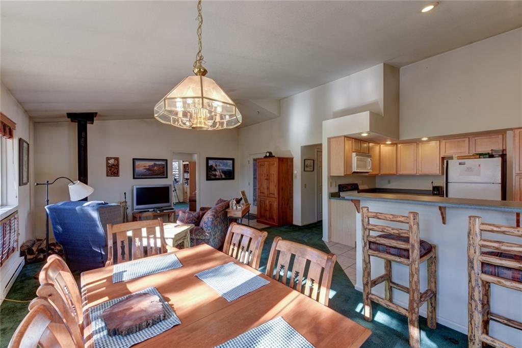 2315 Singletree Road Hartsel, CO 80449 - Photo 12 of 30 a living room with furniture and a flat screen tv