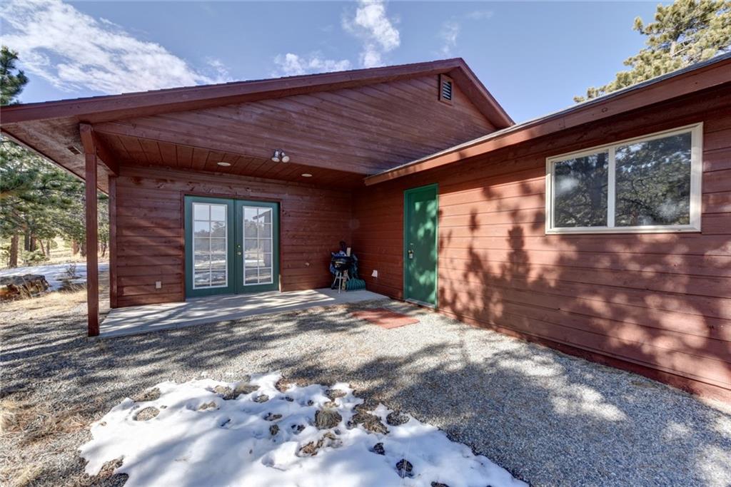 2315 Singletree Road Hartsel, CO 80449 - Photo 3 of 30 a view of a house with backyard and porch