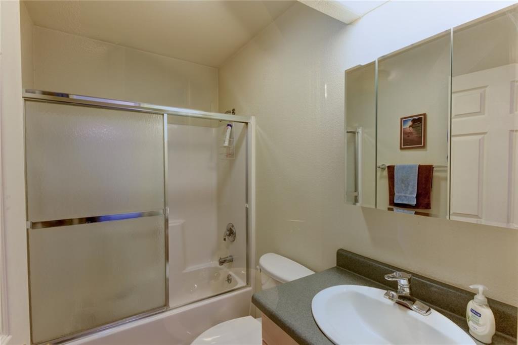 2315 Singletree Road Hartsel, CO 80449 - Photo 24 of 30 a bathroom with a sink toilet and shower