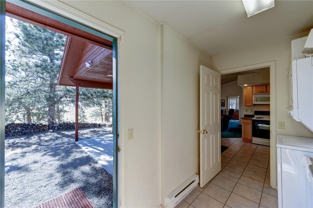 2315 Singletree Road Hartsel, CO 80449 - Photo 25 of 30 a view of a bedroom from the hallway