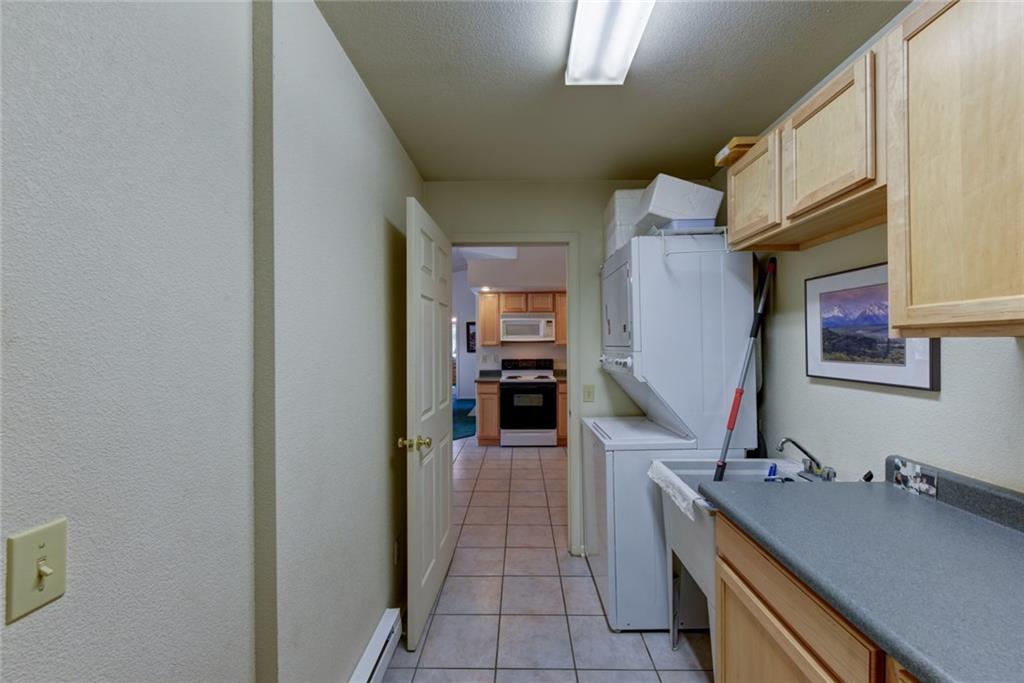 2315 Singletree Road Hartsel, CO 80449 - Photo 27 of 30 a kitchen with a sink and cabinets