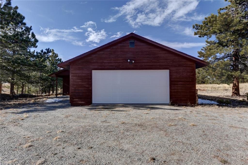 2315 Singletree Road Hartsel, CO 80449 - Photo 30 of 30 a front view of a house with a yard