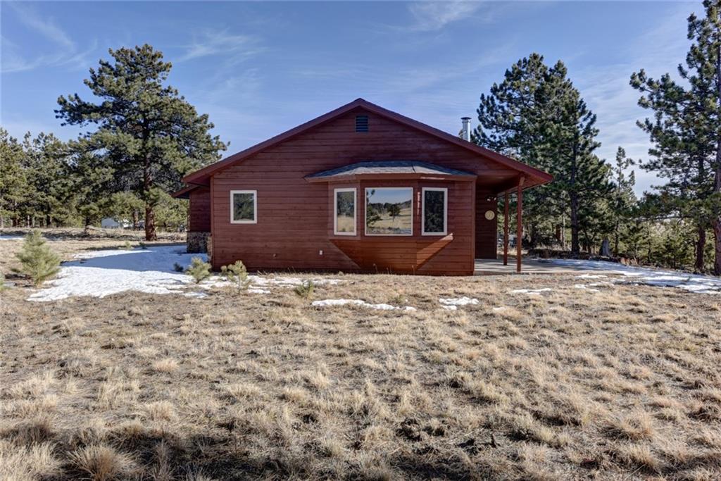 2315 Singletree Road Hartsel, CO 80449 - Photo 5 of 30 a front view of a house with a yard