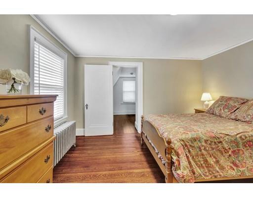 21 Homewood Road Boston, MA 02132 - Photo 17 of 25 a bedroom with a bed and a cabinets
