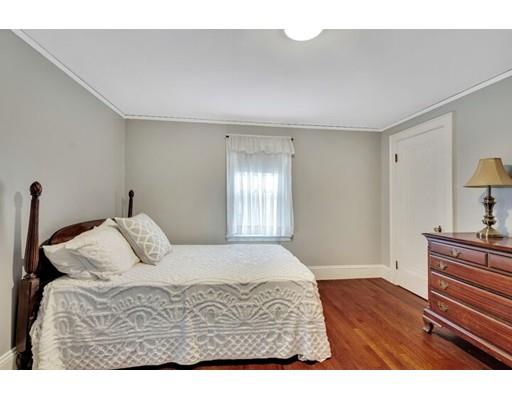 21 Homewood Road Boston, MA 02132 - Photo 18 of 25 a bedroom with a bed and a dresser