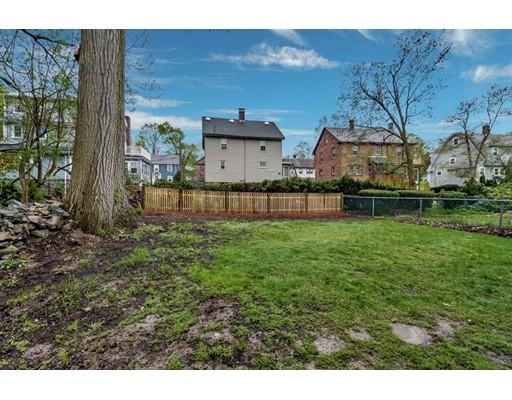 21 Homewood Road Boston, MA 02132 - Photo 24 of 25 a view of house with backyard and garden
