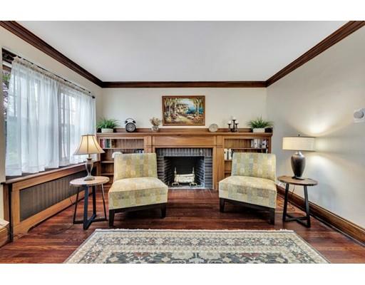 21 Homewood Road Boston, MA 02132 - Photo 5 of 25 a living room with furniture and a fireplace