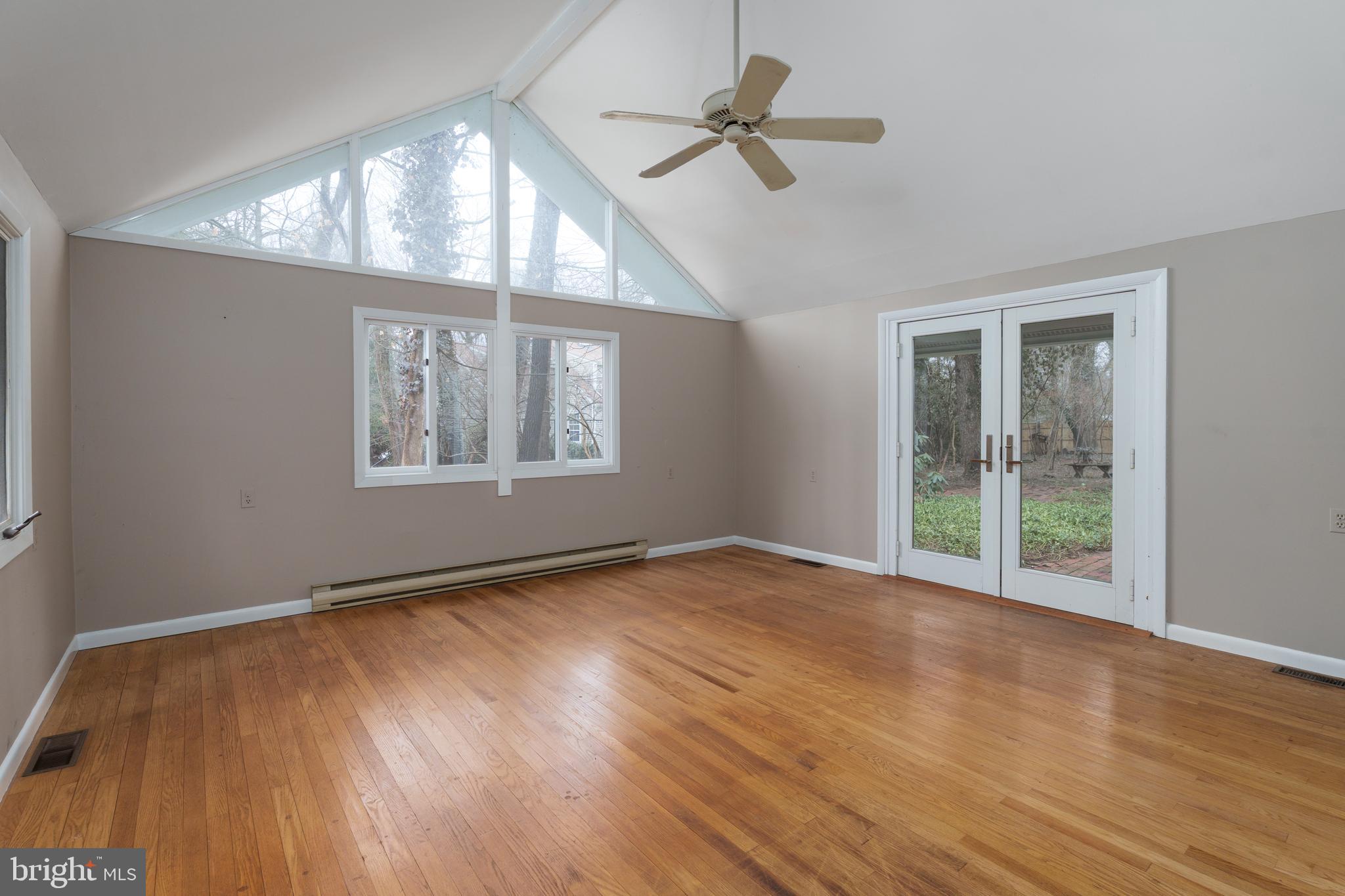 505 Prospect Avenue Princeton, NJ 08540 - Photo 17 of 28 a view of an empty room with a window and wooden floor