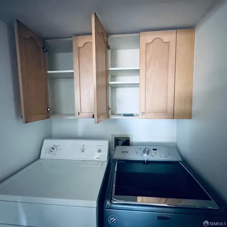 a bathroom with a bathtub and a window