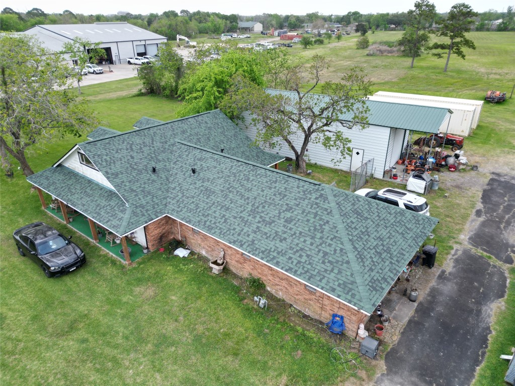 2319 West Cedar Bayou Lynchburg Road Baytown, TX 77521 - Photo 2 of 6 an aerial view of a house having yard