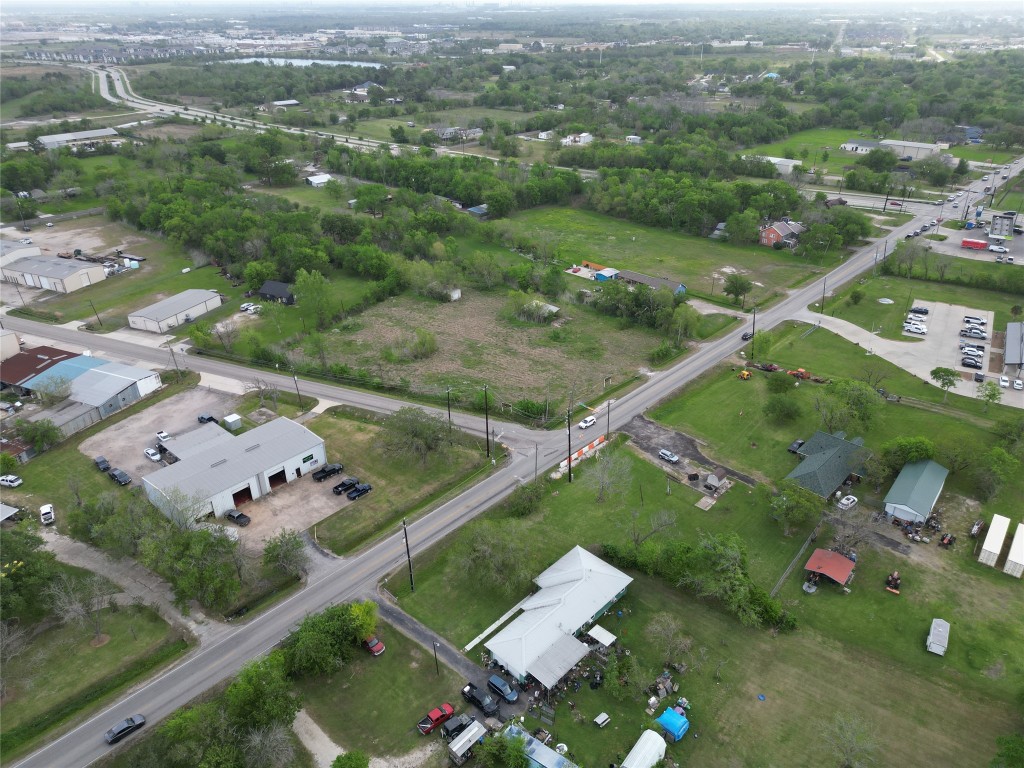 2319 West Cedar Bayou Lynchburg Road Baytown, TX 77521 - Photo 5 of 6 an aerial view of a city with mountains