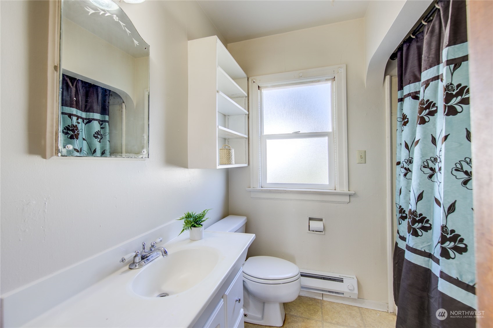 2018 11th Street Bremerton, WA 98337 - Photo 20 of 35 a bathroom with a sink and a toilet