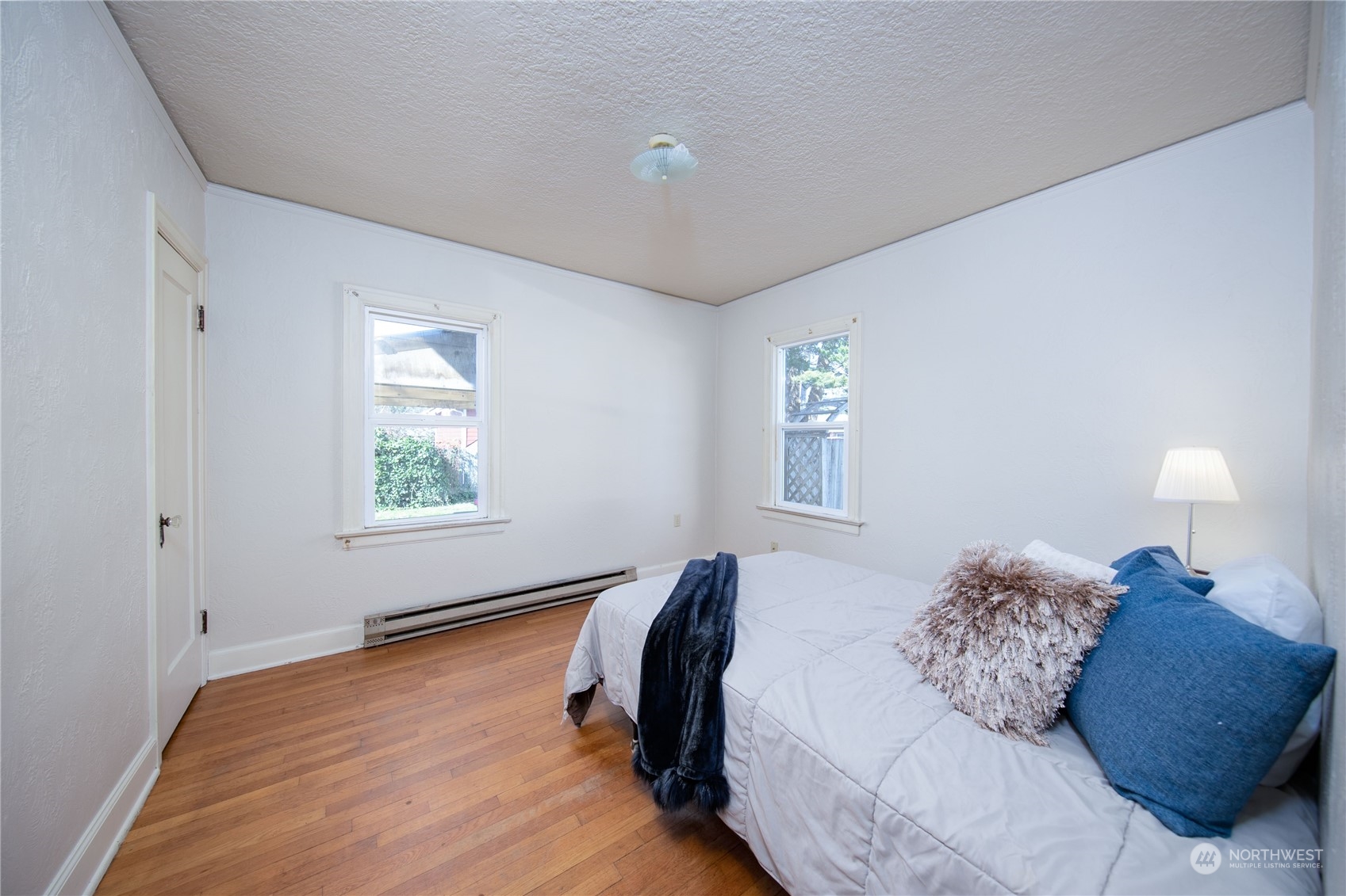 2018 11th Street Bremerton, WA 98337 - Photo 21 of 35 a bedroom with a bed and a window