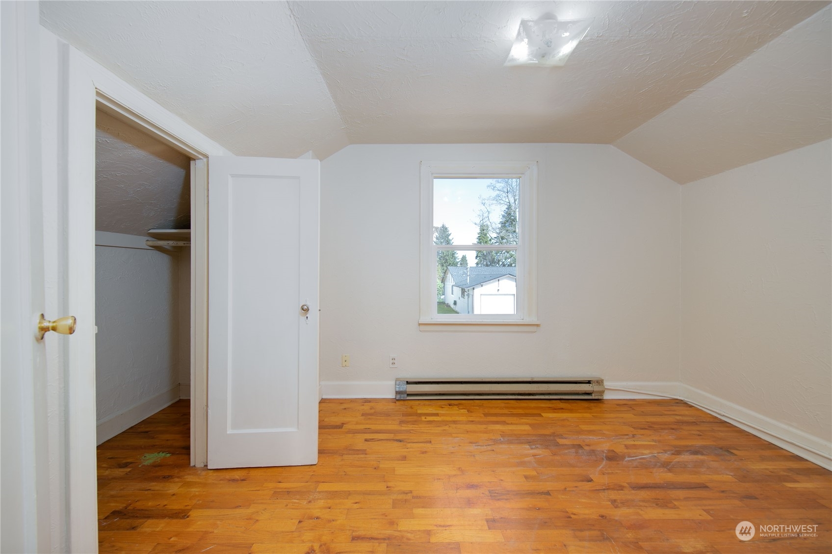 2018 11th Street Bremerton, WA 98337 - Photo 25 of 35 an empty room with windows and closet