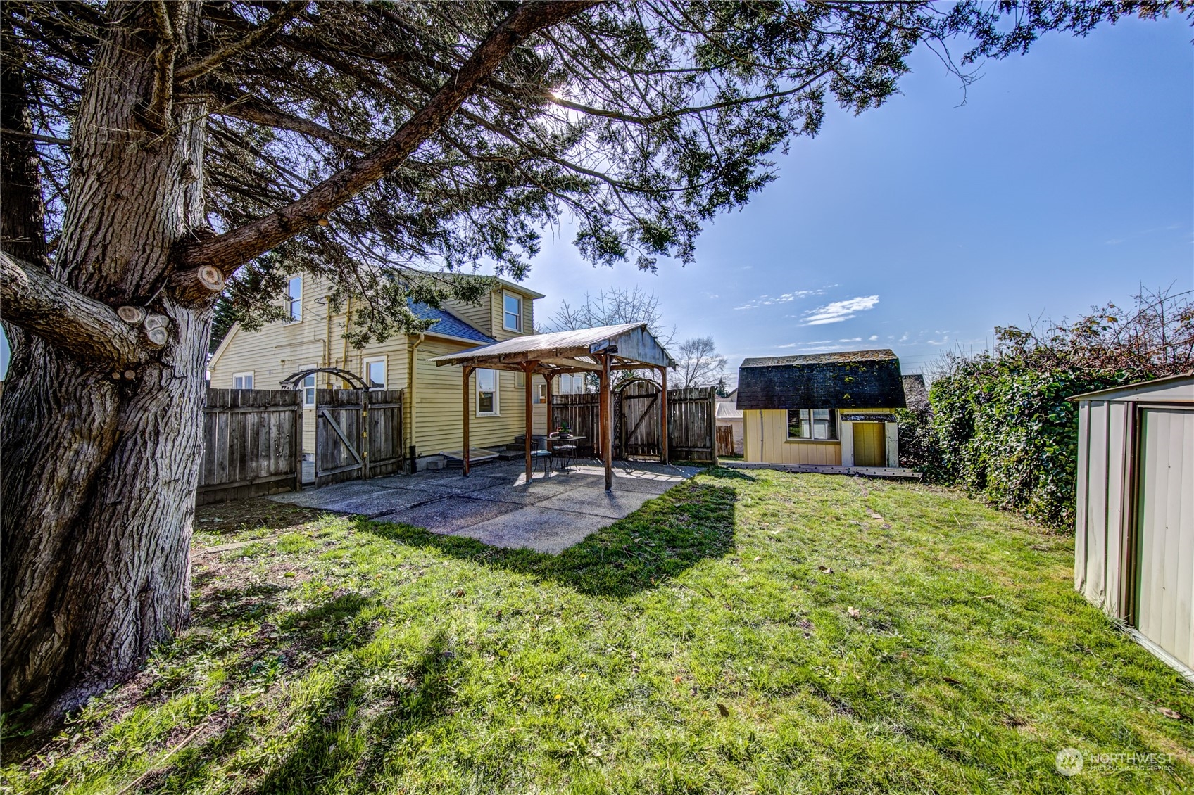 2018 11th Street Bremerton, WA 98337 - Photo 5 of 35 a front view of a house with a yard and fountain