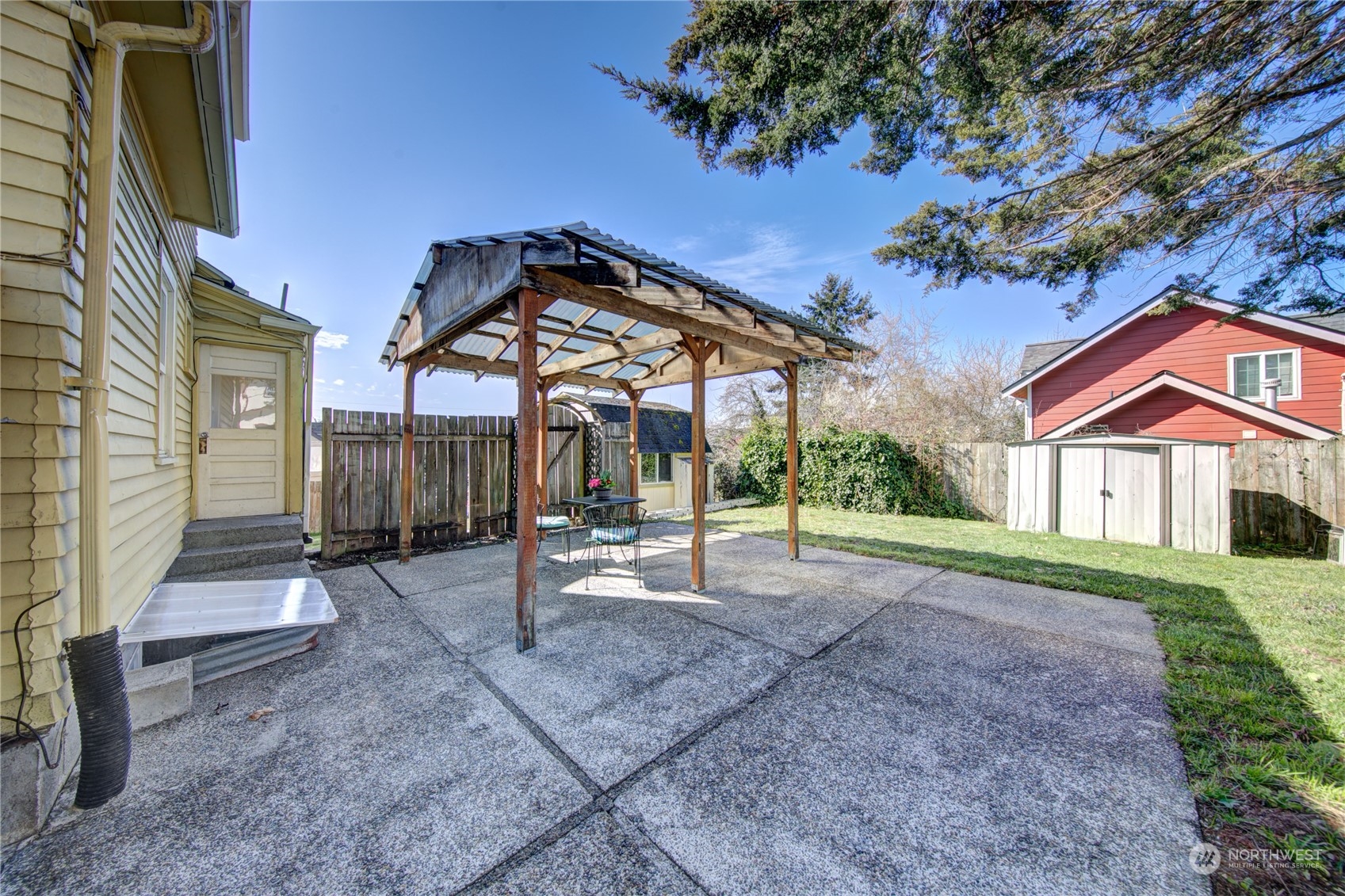 2018 11th Street Bremerton, WA 98337 - Photo 6 of 35 a view of a house with backyard and sitting area