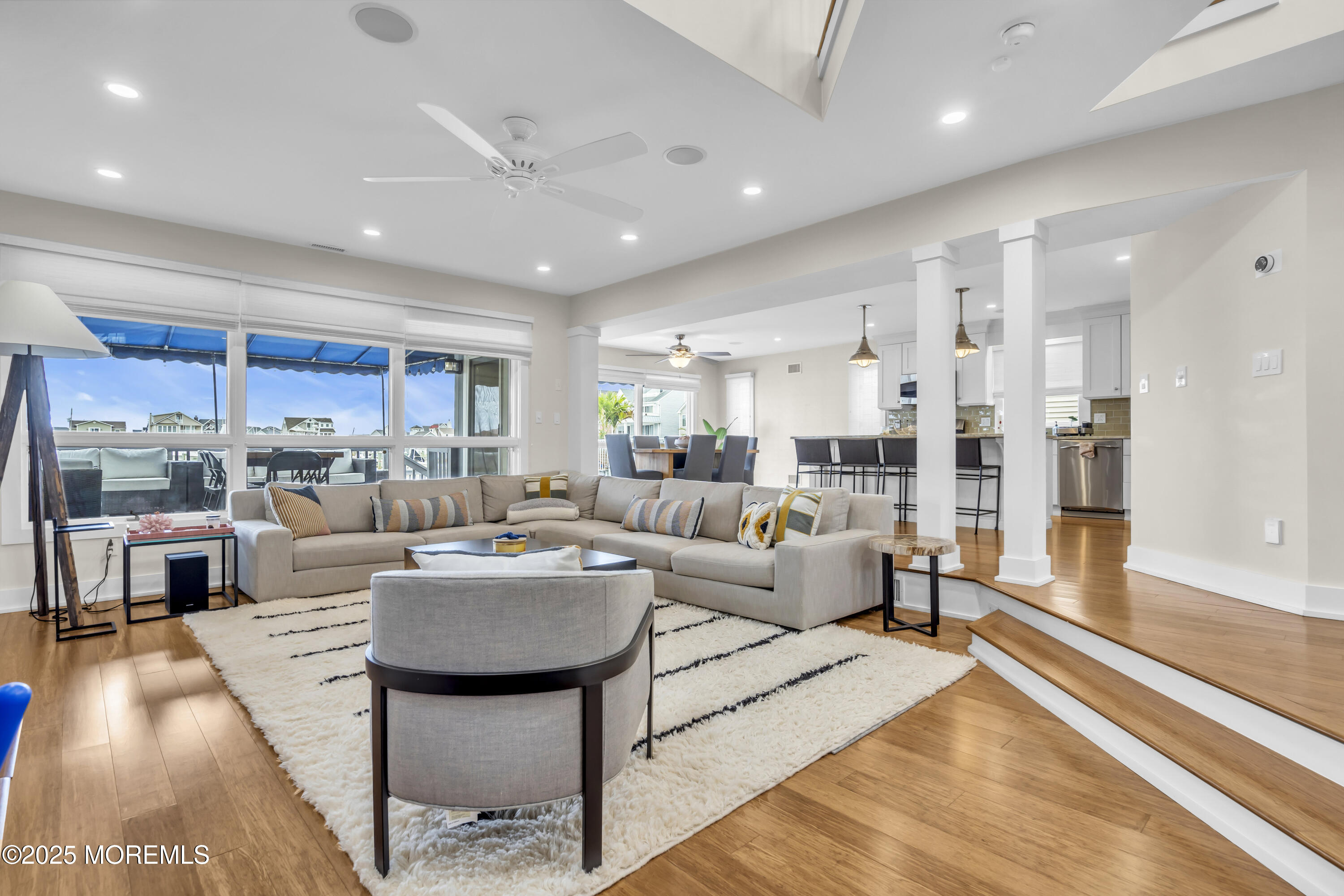 254 Harbor Court Lavallette, NJ 08735 - Photo 2 of 44 a living room with furniture and a table