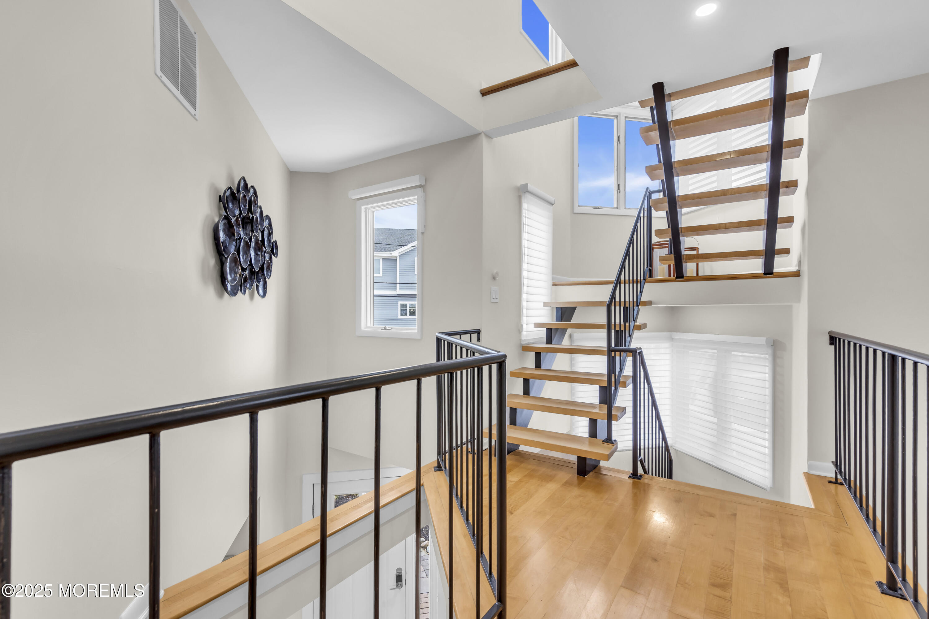 254 Harbor Court Lavallette, NJ 08735 - Photo 27 of 44 a view of entryway with wooden floor and windows