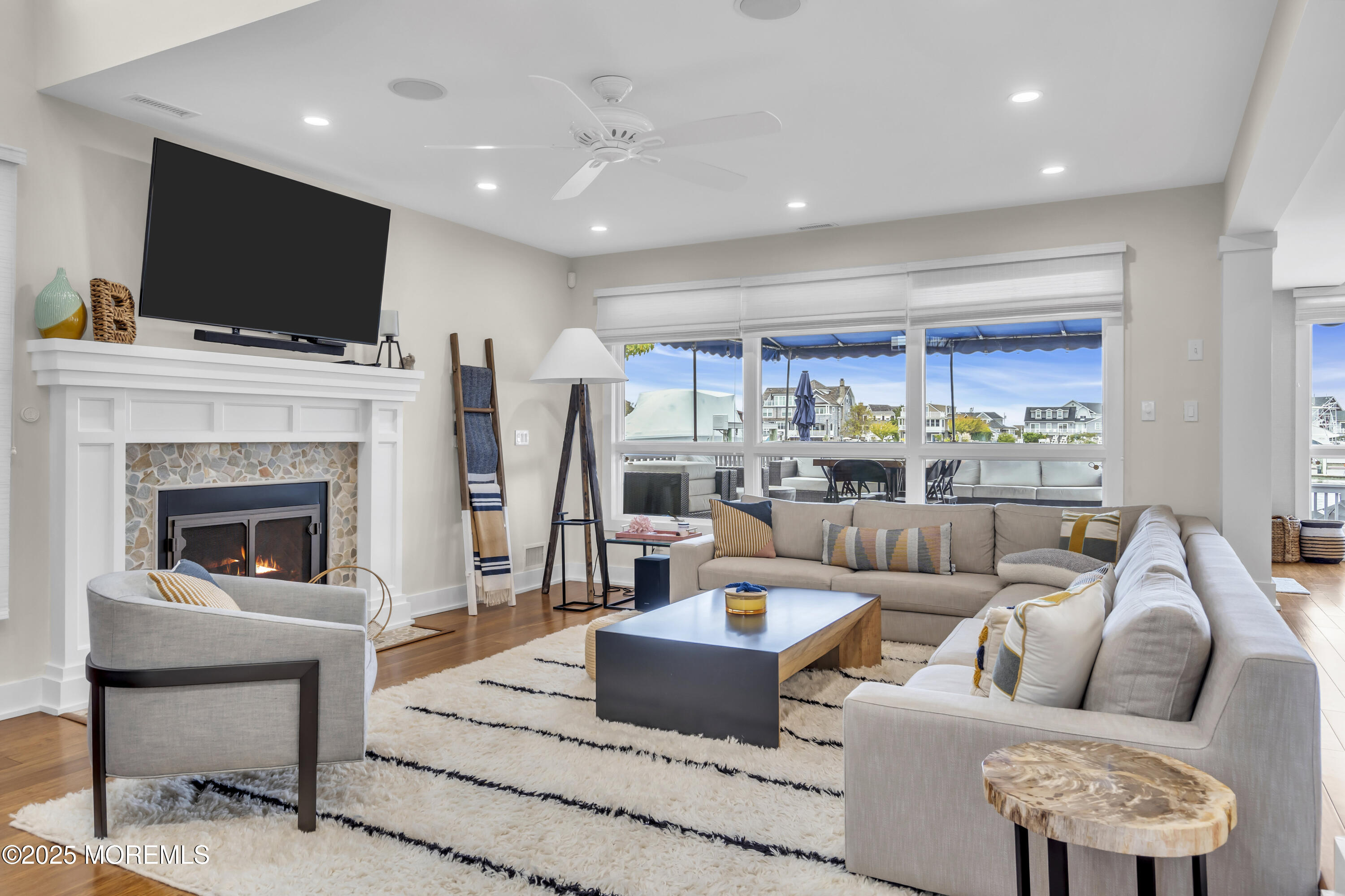 254 Harbor Court Lavallette, NJ 08735 - Photo 3 of 44 a living room with fireplace furniture and a flat screen tv