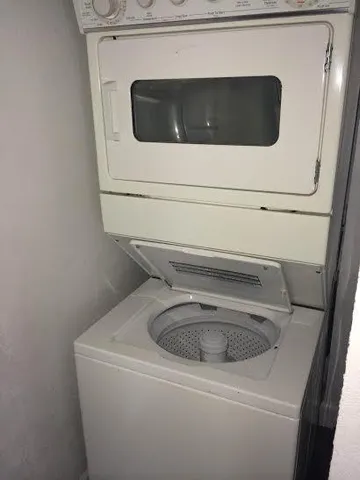 a utility room with washer and dryer
