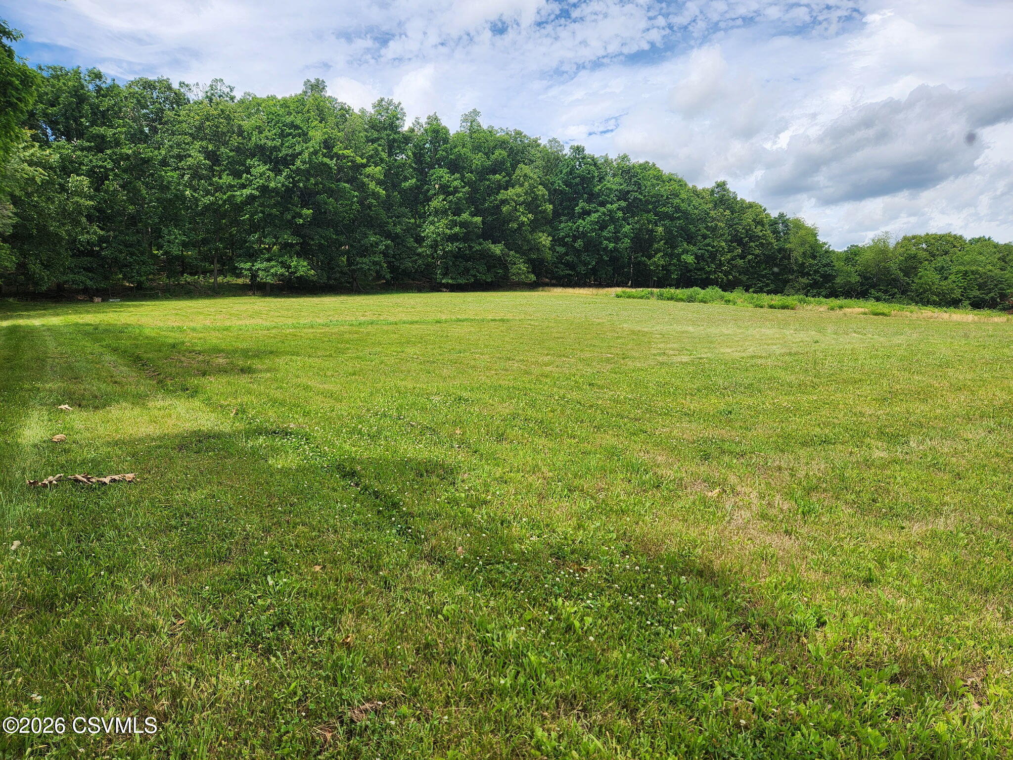 Valley West Road Danville, PA 17821 - Photo 3 of 14 a view of a green field with clear sky