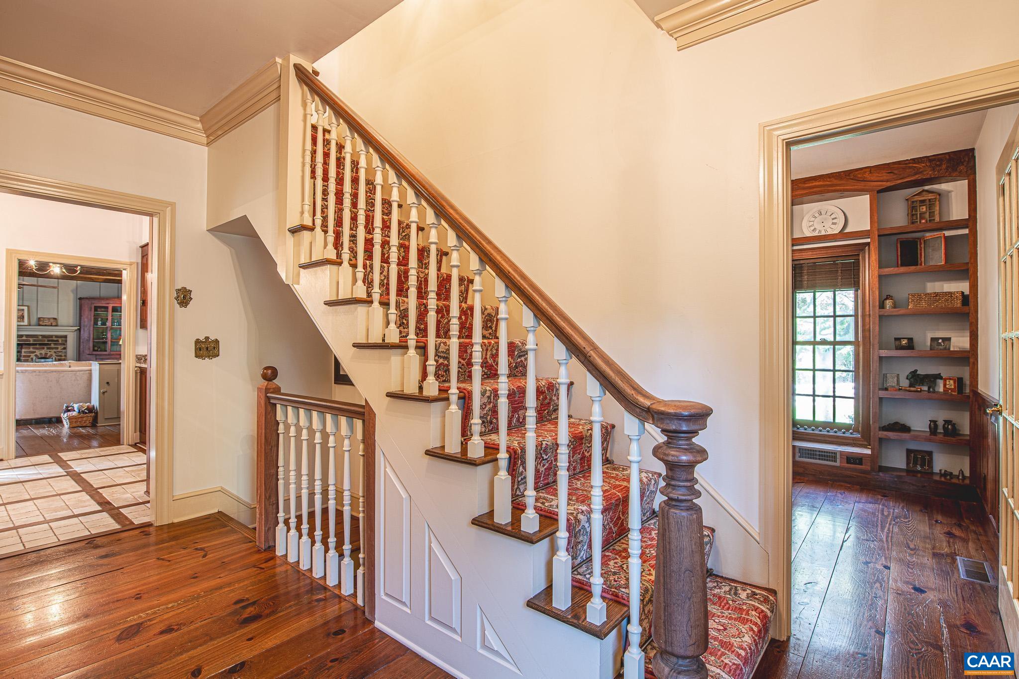 263 Baynes Road Waynesboro, VA 22980 - Photo 12 of 74 a view of an entryway with wooden floor and windows