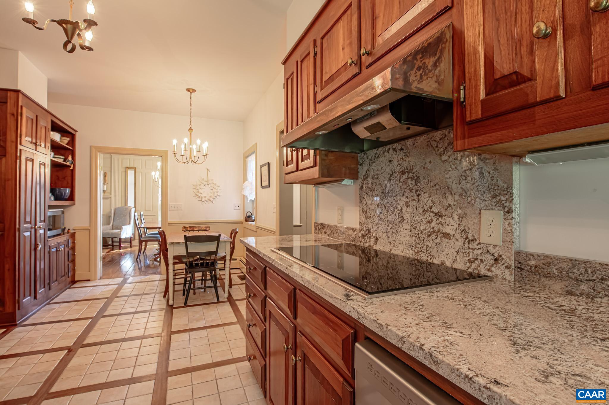 263 Baynes Road Waynesboro, VA 22980 - Photo 20 of 74 a kitchen with stainless steel appliances granite countertop a sink and cabinets