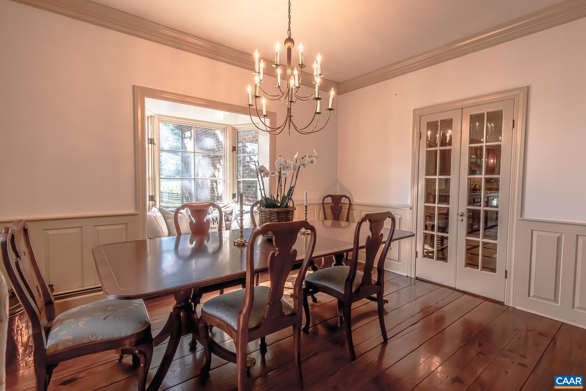 263 Baynes Road Waynesboro, VA 22980 - Photo 32 of 74 a view of a dining room with furniture window and wooden floor