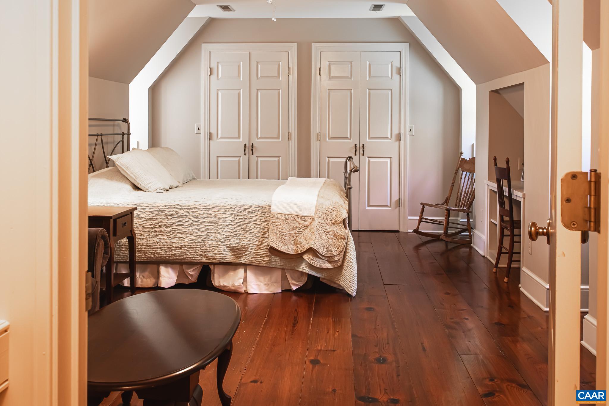 263 Baynes Road Waynesboro, VA 22980 - Photo 40 of 74 a bedroom with a bed and a table