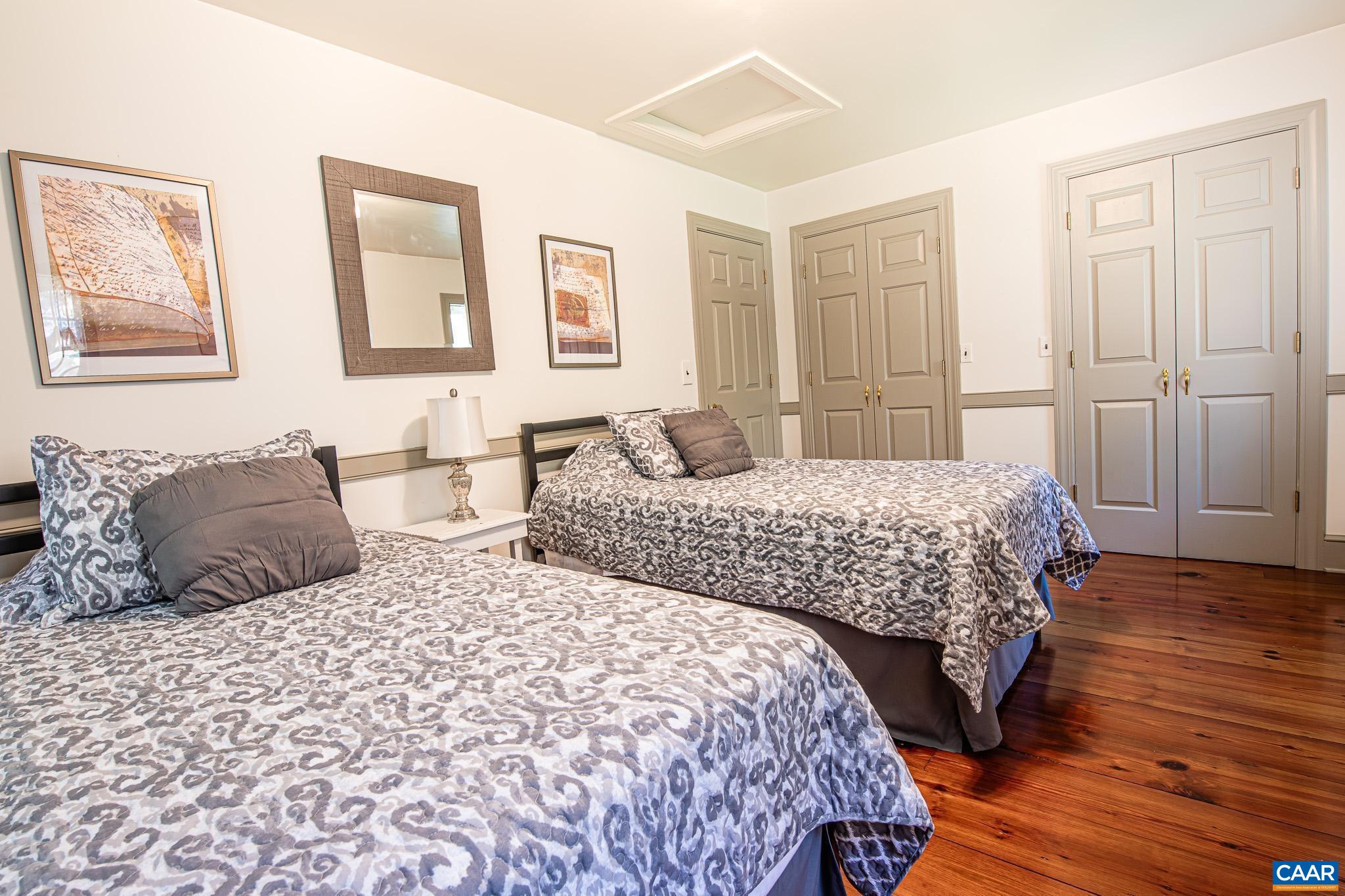 263 Baynes Road Waynesboro, VA 22980 - Photo 45 of 74 a bedroom with two beds and a lamp
