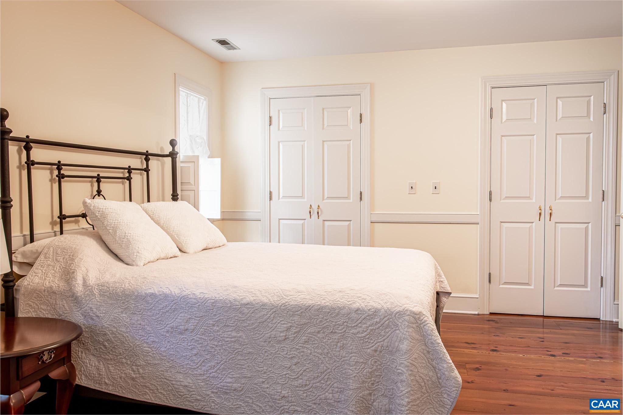 263 Baynes Road Waynesboro, VA 22980 - Photo 47 of 74 a large white bed in a white room