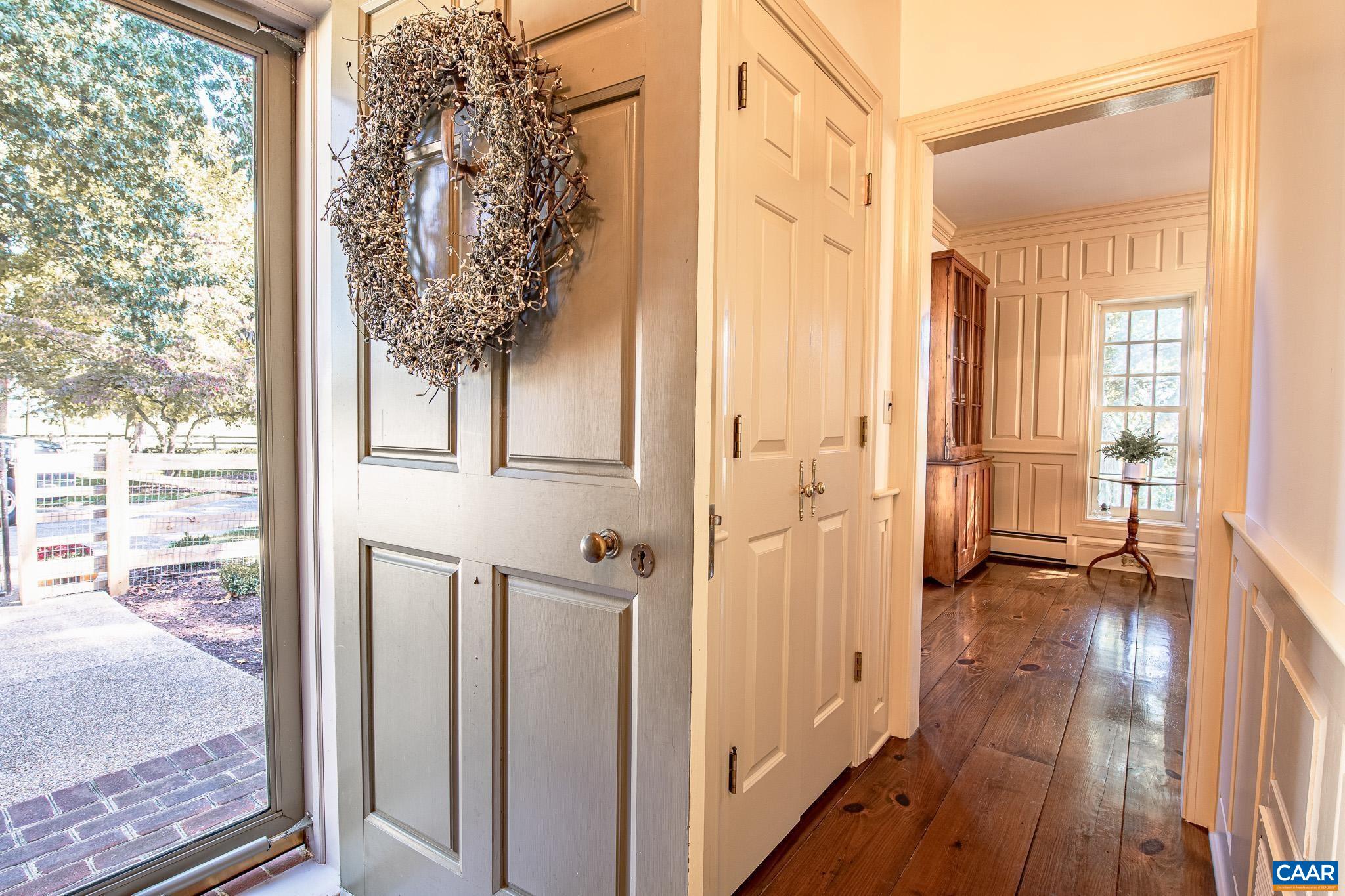 263 Baynes Road Waynesboro, VA 22980 - Photo 10 of 74 a view of a entrance and a livingroom with wooden floor