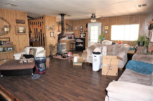 42974 Manatee Street Newberry Springs, CA 92365 - Photo 14 of 20 a living room with furniture and a large window