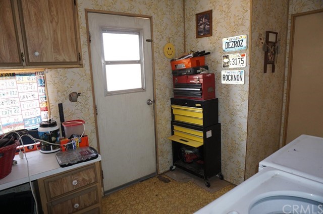 42974 Manatee Street Newberry Springs, CA 92365 - Photo 19 of 20 a view of a room with workspace and a window