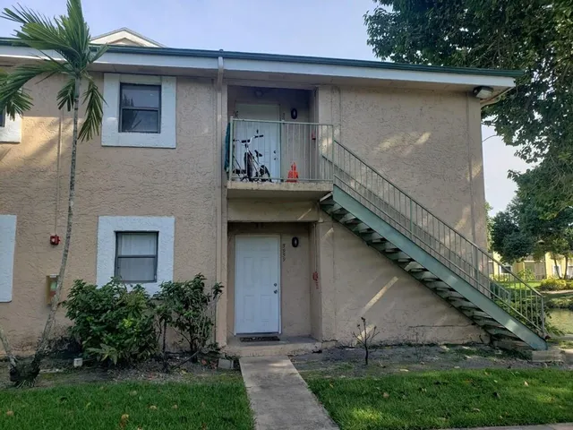 a view of house with outdoor space