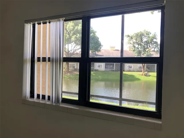 a view of a large window with an outdoor space