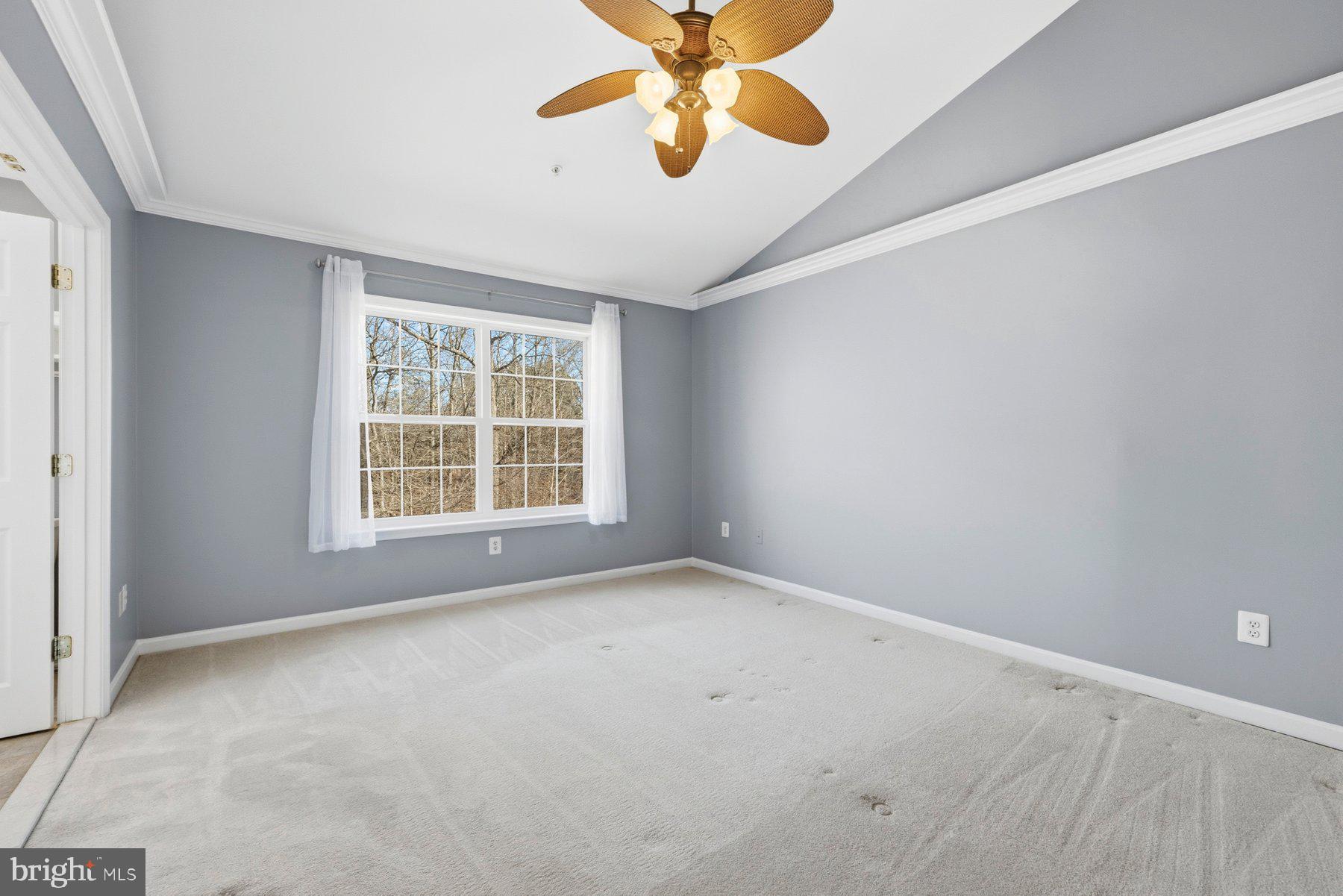 2640 Streamview Drive Odenton, MD 21113 - Photo 20 of 73 an empty room with windows and fan