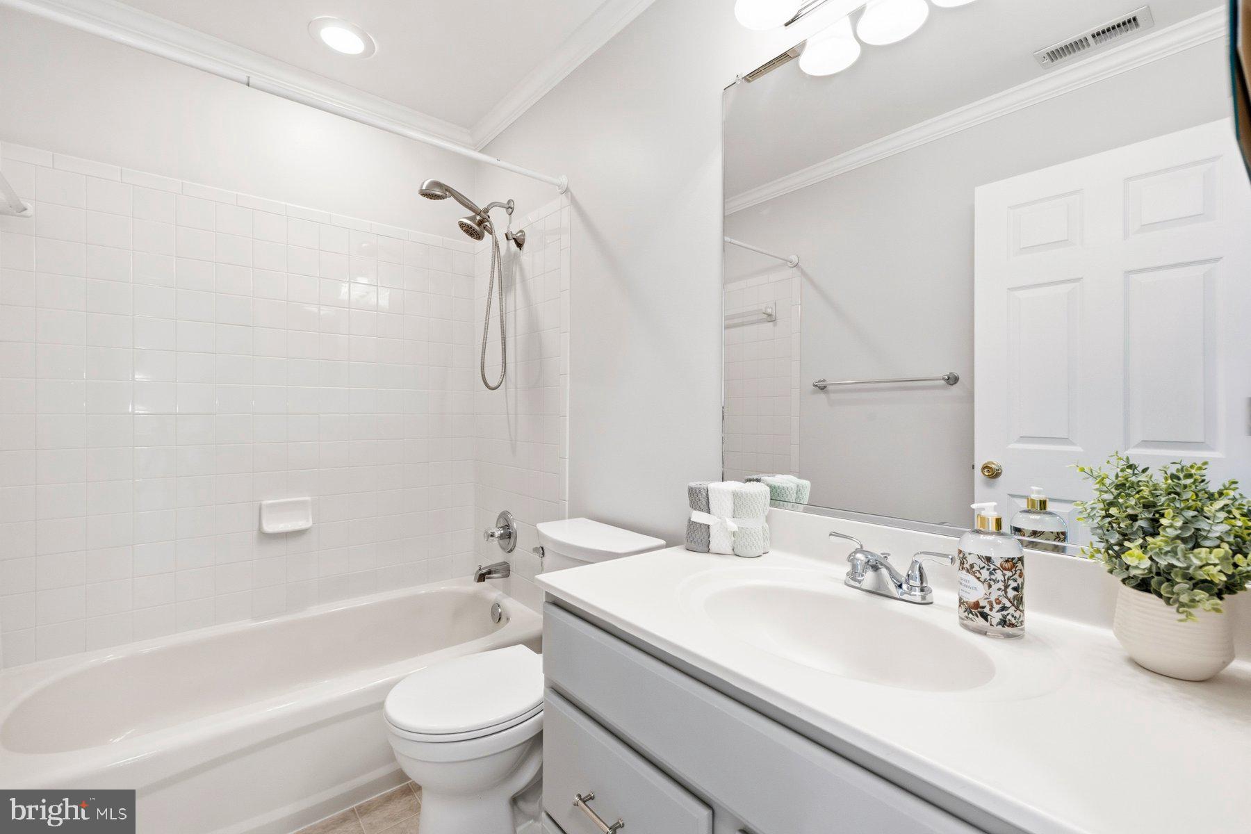 2640 Streamview Drive Odenton, MD 21113 - Photo 32 of 73 a bathroom with a sink a toilet and shower