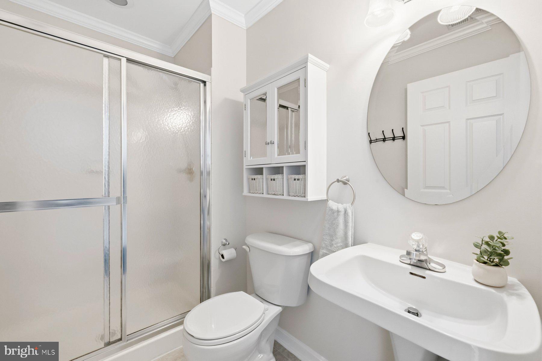 2640 Streamview Drive Odenton, MD 21113 - Photo 39 of 73 a bathroom with a sink toilet and shower