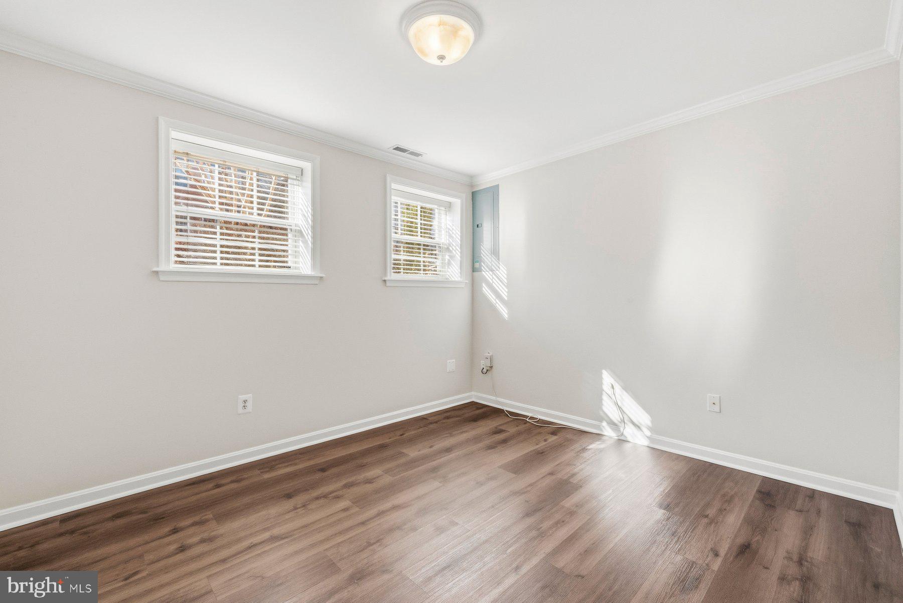 2640 Streamview Drive Odenton, MD 21113 - Photo 40 of 73 wooden floor in an empty room with a window