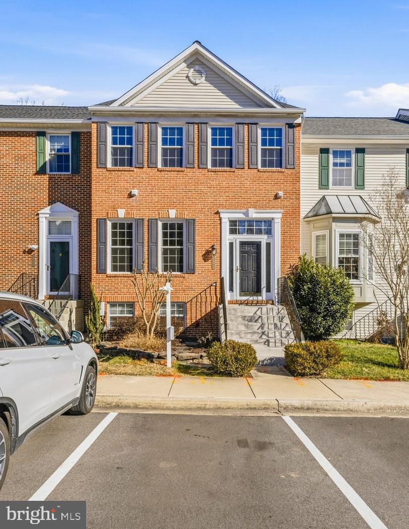 2640 Streamview Drive Odenton, MD 21113 - Photo 47 of 73 a front view of a house with a yard