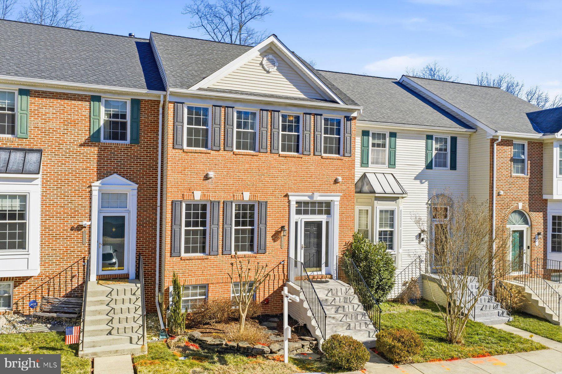 2640 Streamview Drive Odenton, MD 21113 - Photo 48 of 73 a front view of a house with a yard