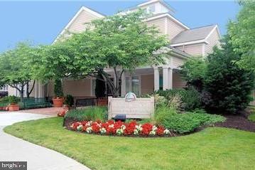 2640 Streamview Drive Odenton, MD 21113 - Photo 50 of 73 a view of a house with a garden
